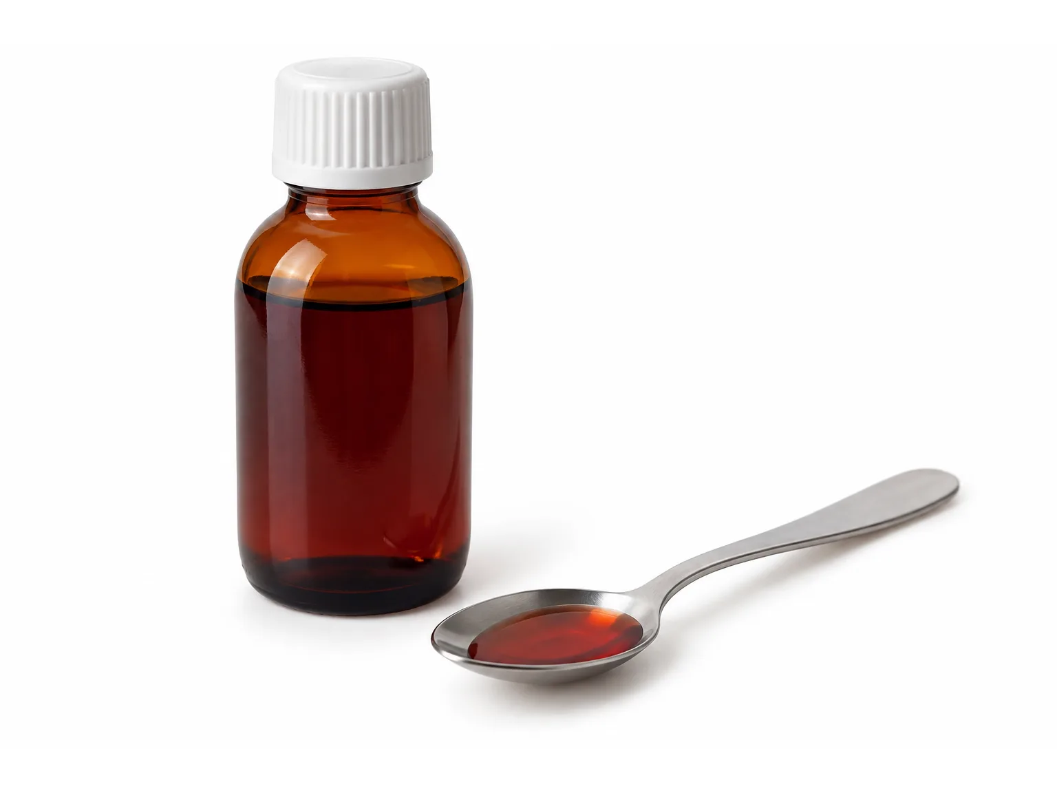Option A: a bottle of cough syrup next to a spoon